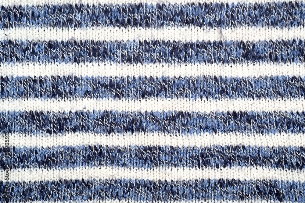 Isolated part of knitted blue and white wool plaid (background) Isolated part of knitted blue and white wool plaid (background)