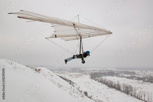 Student hang glider pilot on the training hill.