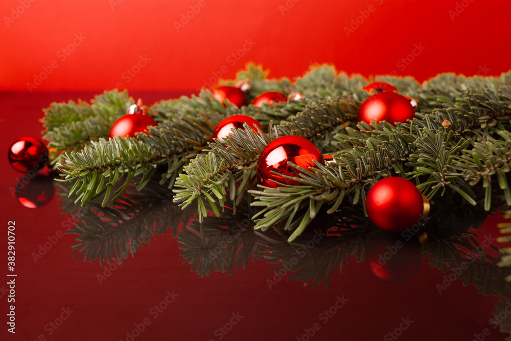 Christmas festive background with coniferous branches and Christmas balls Christmas festive background with coniferous branches and Christmas balls