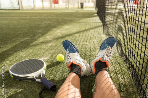 Feet of the padel tennis player exhausted after playing a match