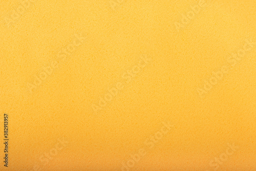 Yellow lint-free fabric as background or texture.