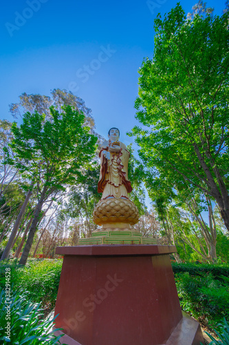 Beautifully vibrant colourful and Landscaped Gardens in a Buddhist temple in Wollongong NSW Australia photo