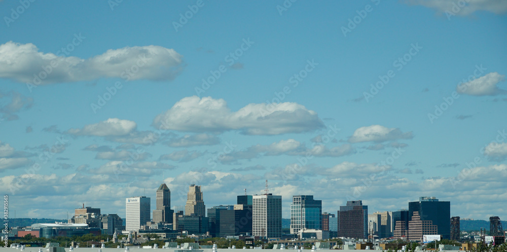 Wispy clouds over skyline of Newark New Jersey