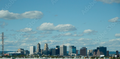Wispy clouds over skyline of Newark New Jersey
