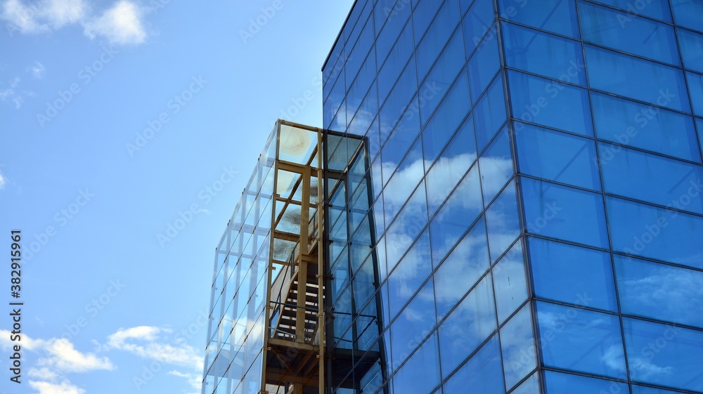 Fragment facade of a modern office building with glazing, perspective. Fragment facade of a modern office building with glazing, perspective.