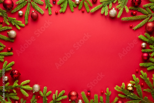 Red christmas background with oval frame