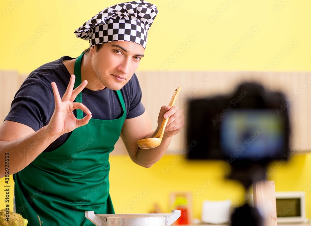Young chef blogger explaining food preparation Young chef blogger explaining food preparation