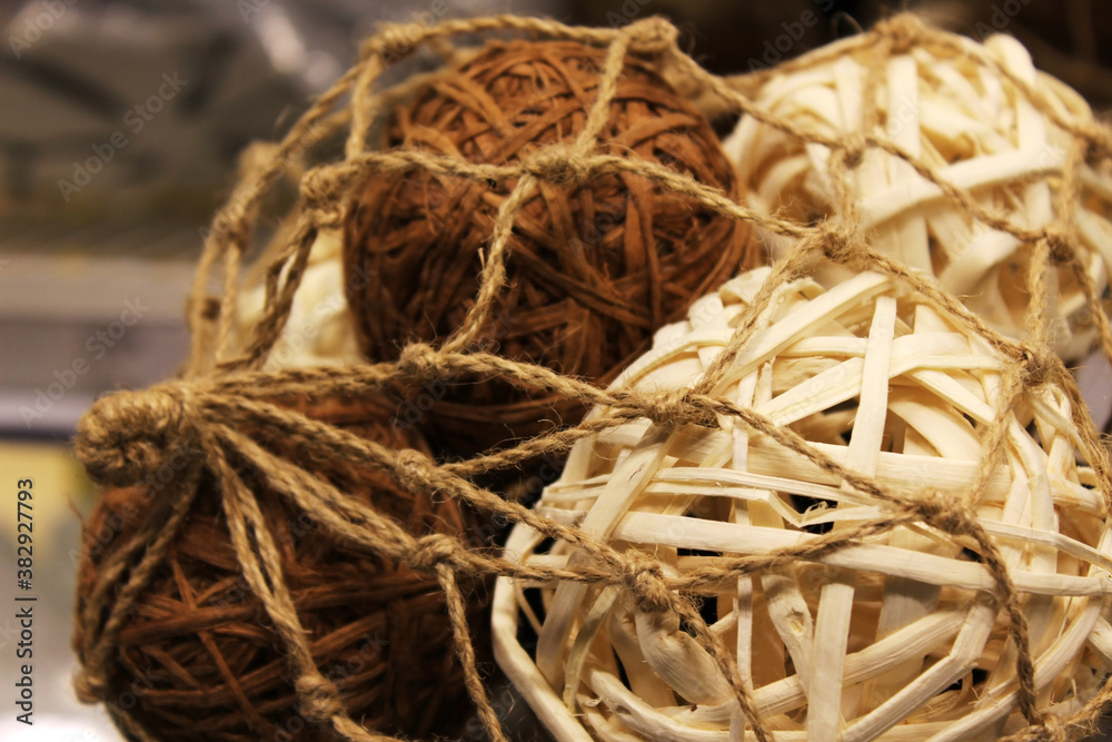 Several spherical objects woven from tree fibers Several spherical objects woven from tree fibers