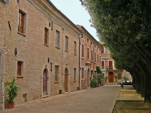 Italy, Marche, Corinaldo downtown medieval street. 