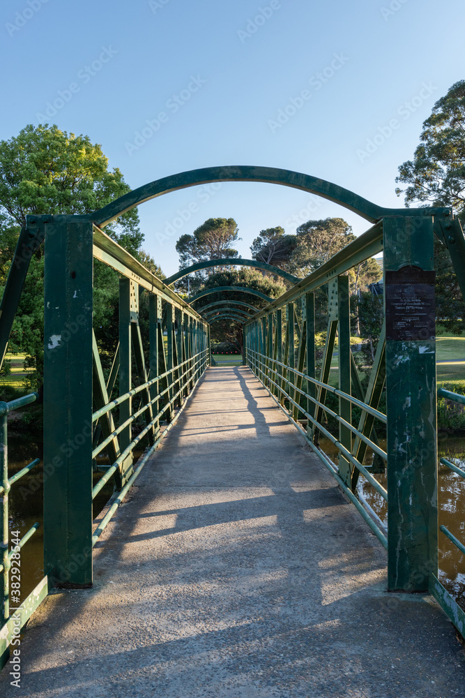 Green steel bridge above Parramatta River.