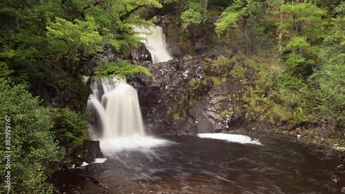 shot of Eas Chia-Aig waterfalls in Glen Chia-Aig near Achnacarry, Gairlochy and Fort William in the argyll region of the highlands of Scotland during autumn after heavy rainfall photo