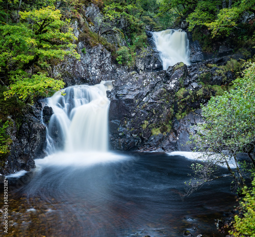 shot of Eas Chia-Aig waterfalls in Glen Chia-Aig near Achnacarry  Gairlochy and Fort William in the argyll region of the highlands of Scotland during autumn after heavy rainfall