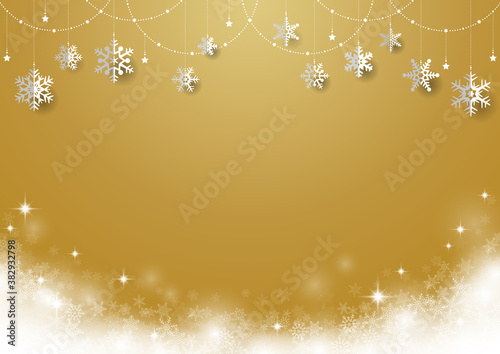 雪の結晶がぶら下がった キラキラ イルミネーションのクリスマス背景 フレーム　金