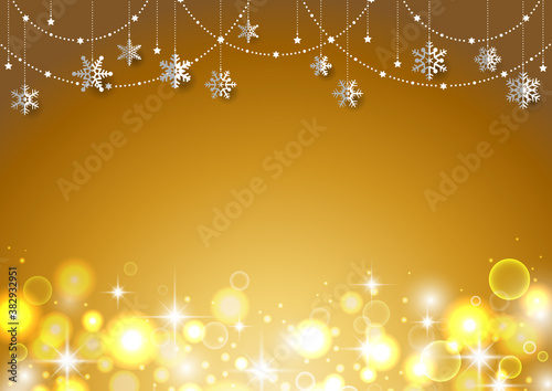 雪の結晶がぶら下がった キラキラ イルミネーションのクリスマス背景 フレーム　金