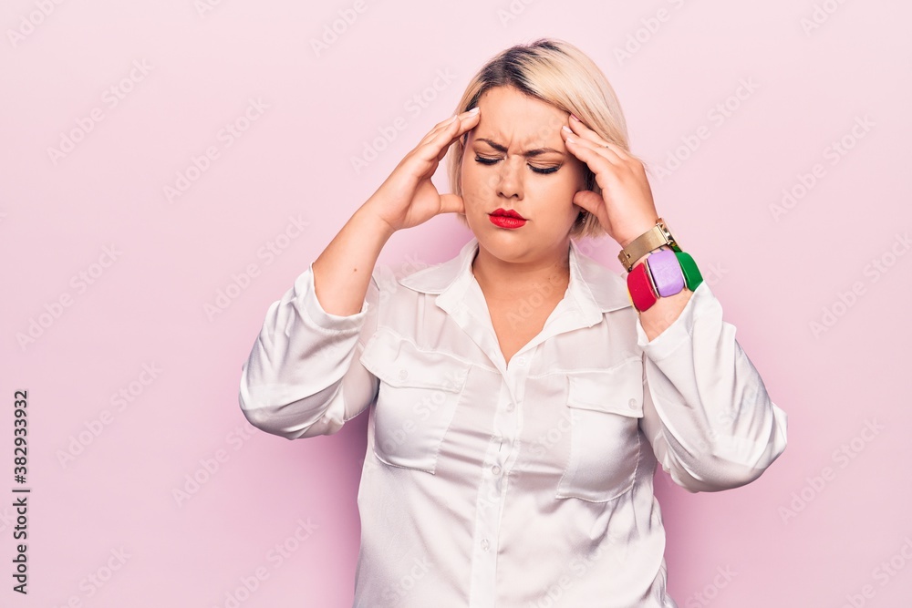 Young beautiful blonde plus size woman wearing elegant shirt over isolated pink background with hand on head, headache because stress. Suffering migraine. Young beautiful blonde plus size woman wearing elegant shirt over isolated pink background with hand on head, headache because stress. Suffering migraine.