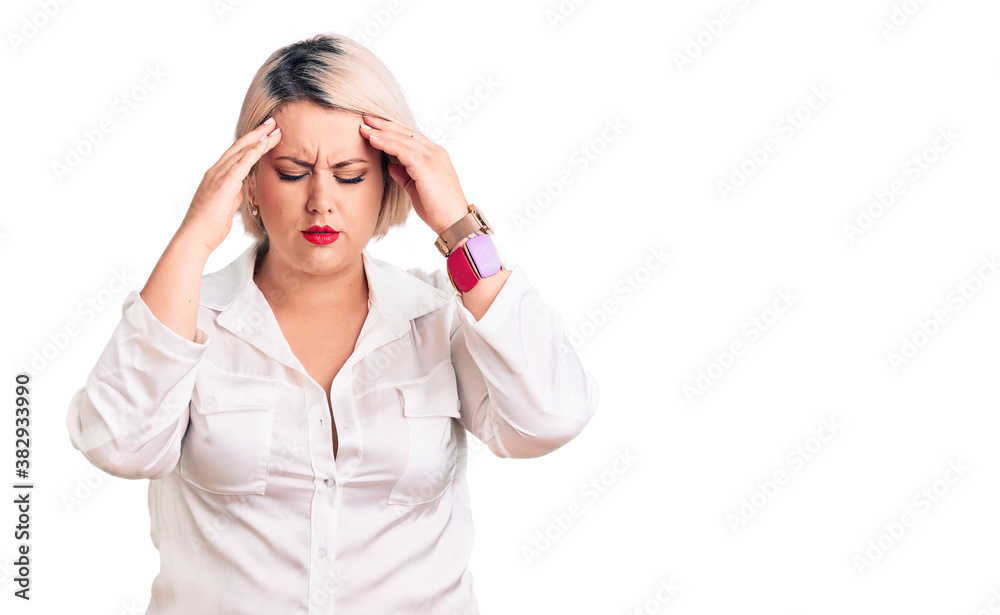 Young blonde plus size woman wearing casual shirt with hand on head for pain in head because stress. suffering migraine. Young blonde plus size woman wearing casual shirt with hand on head for pain in head because stress. suffering migraine.