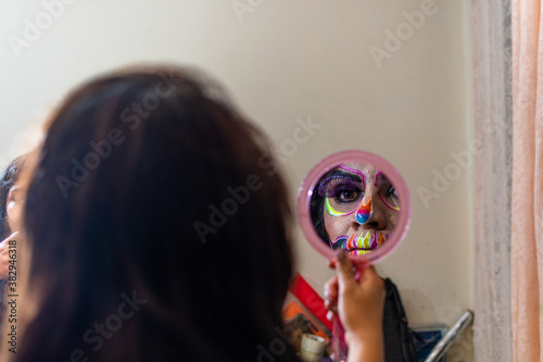 woman putting makeup on another woman