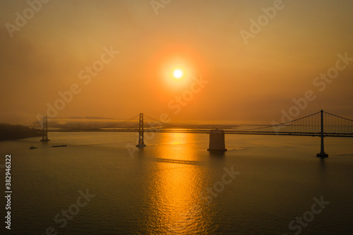 Eerie orange sky over Bay Bridge in San Francisco