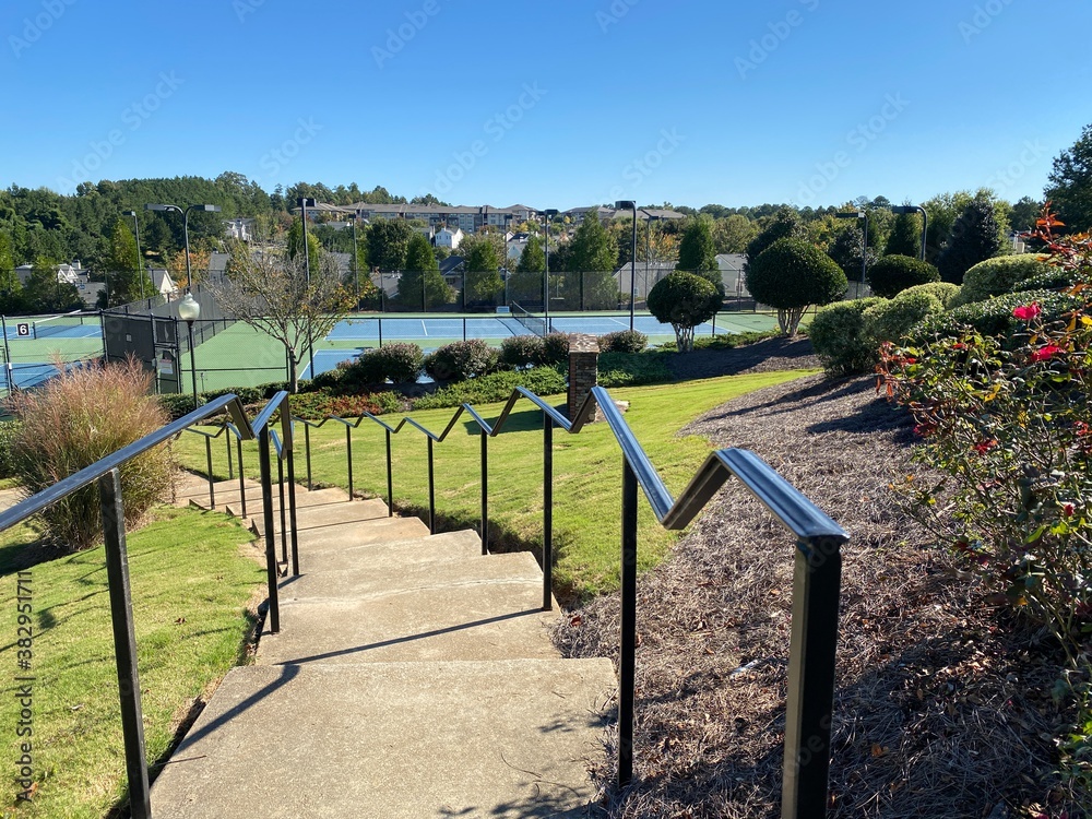 Fototapeta premium the stairs leading down the tennis court