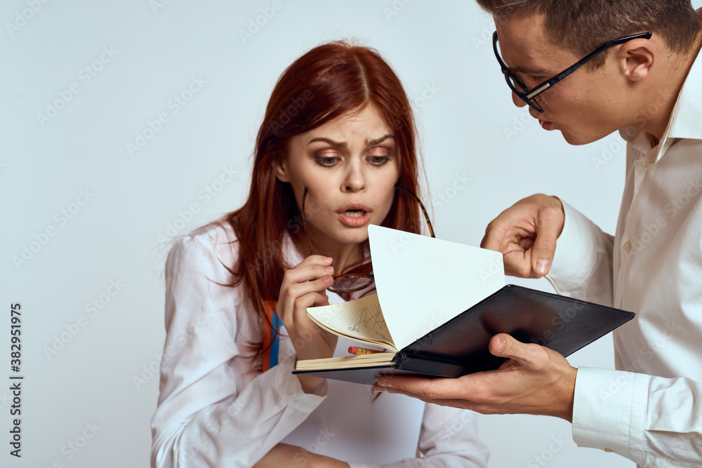 business man and woman secretary documents employees colleagues on light background cropped view business man and woman secretary documents employees colleagues on light background cropped view