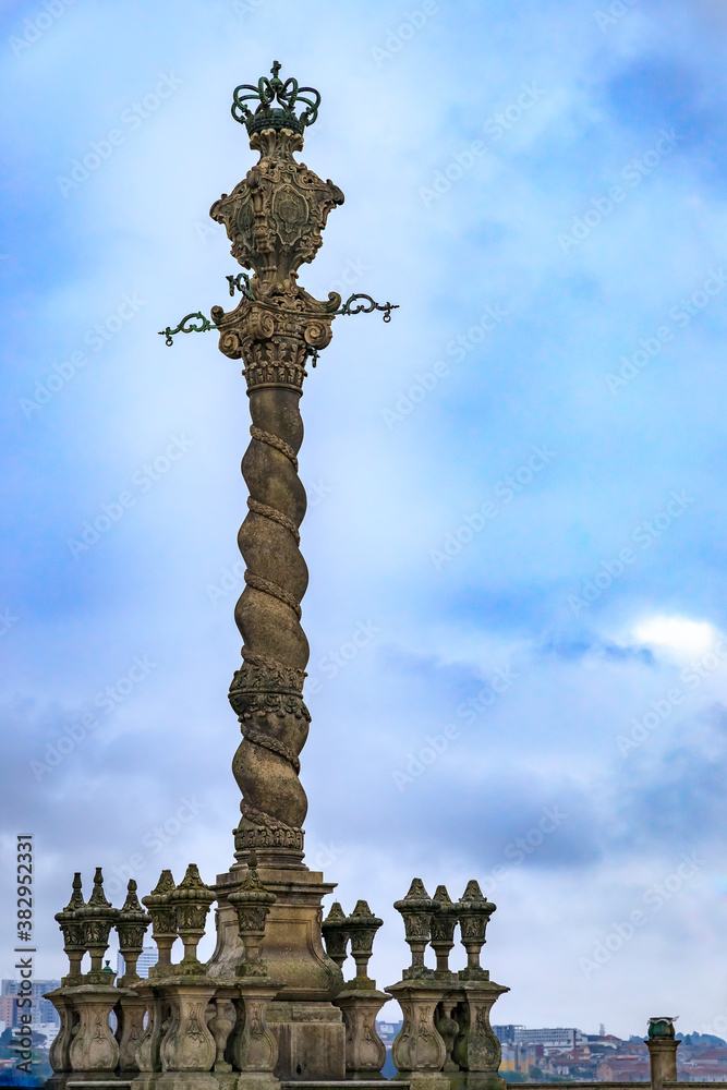 Fototapeta premium Pelourinho pillar monument at the Cathedral of Assumption of Our Lady or Se Catedral in historic center Porto, Portugal