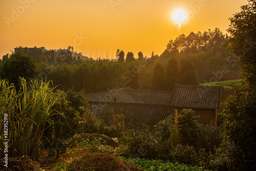 Mountain village dwellings at sunset
