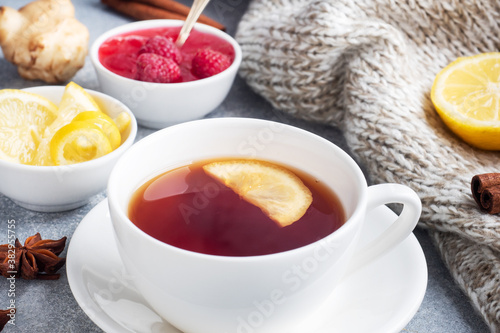 Lemon raspberry jam hot tea. Warming products for the prevention of colds and flu. Copy space.