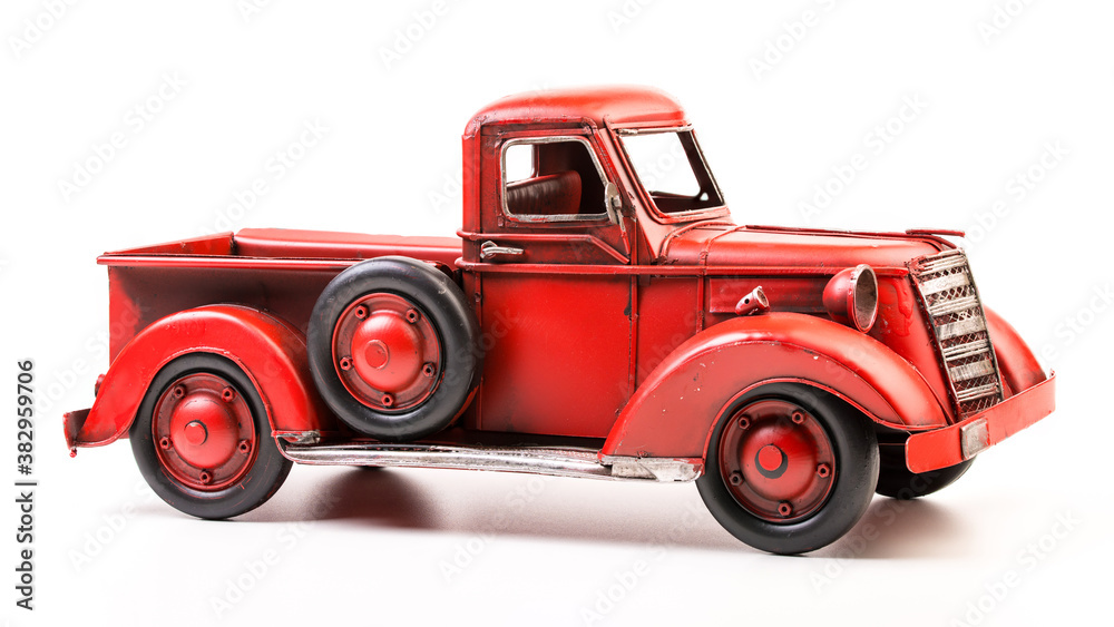 Red pickup truck. Old vintage metal pickup truck. Retro car on white isolated background. 
