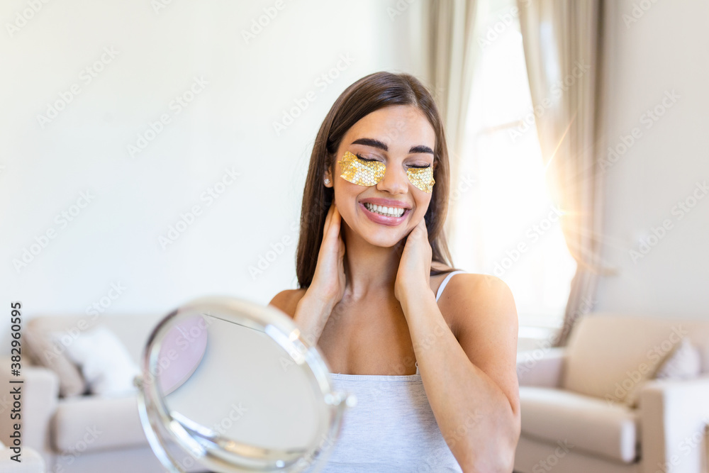 Portrait of pretty, nice grandmother with eye patches, having bags under eyes in the morning because of less sleep, showing an effect of perfect skin Portrait of pretty, nice grandmother with eye patches, having bags under eyes in the morning because of less sleep, showing an effect of perfect skin