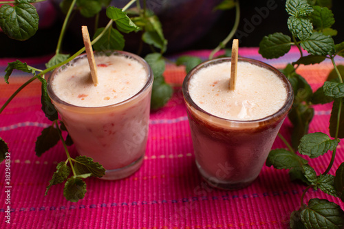 Malai kulfi traditional Indian ice scream or Qulfi, Rajasthani home made ready to eat frozen dairy dessert. rajwari or rajwadi sweet kesar badam pista ice cream candy photo