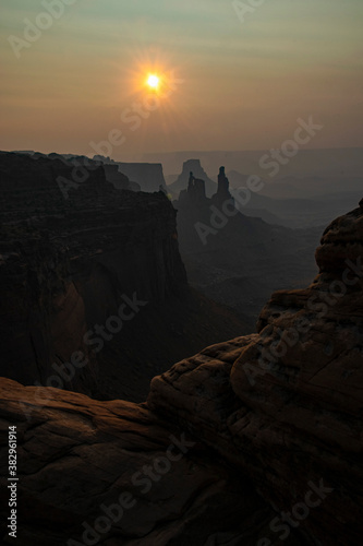 Sunrise In Canyonlands Through Smoke photo