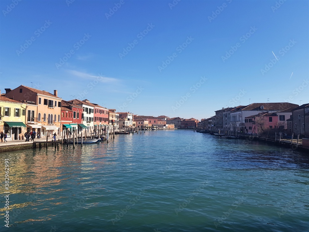View of Murano (Venice) from a bridge over the river. Murano (Venice) architecture.