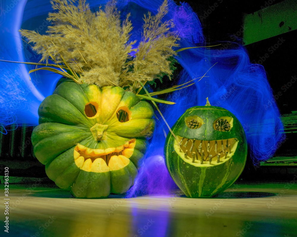 Preparing for Halloween, pumpkin carving, green carved pumpkins for