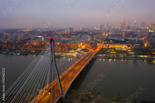 Swietokrzyski bridge over the Vistula river at night. Warsaw, Poland