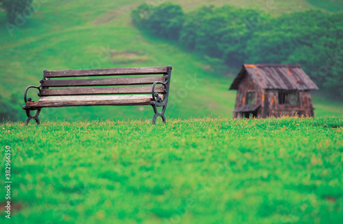 bench and architecture in grassland
