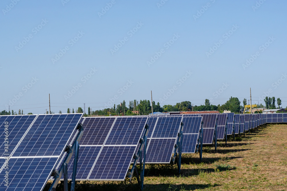 Rows of solar panels in a field. Rows of solar panels in a field.