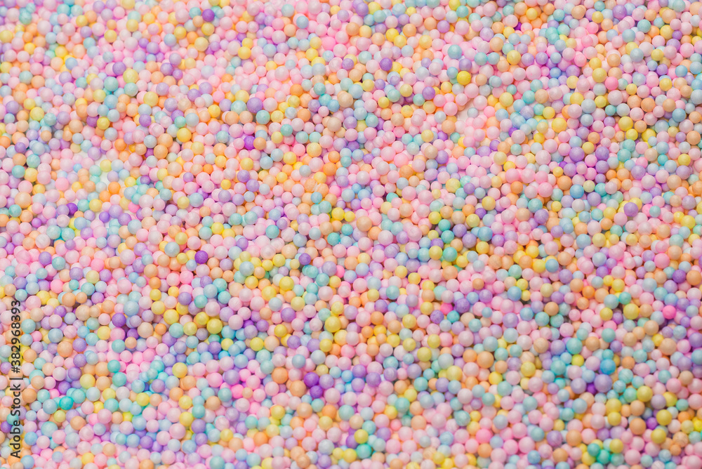 Purple, yellow, blue plastic balls. Purple, yellow, blue plastic balls.