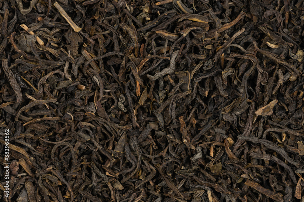 Dried tea leaves background texture. close-up Dried tea leaves background texture. close-up