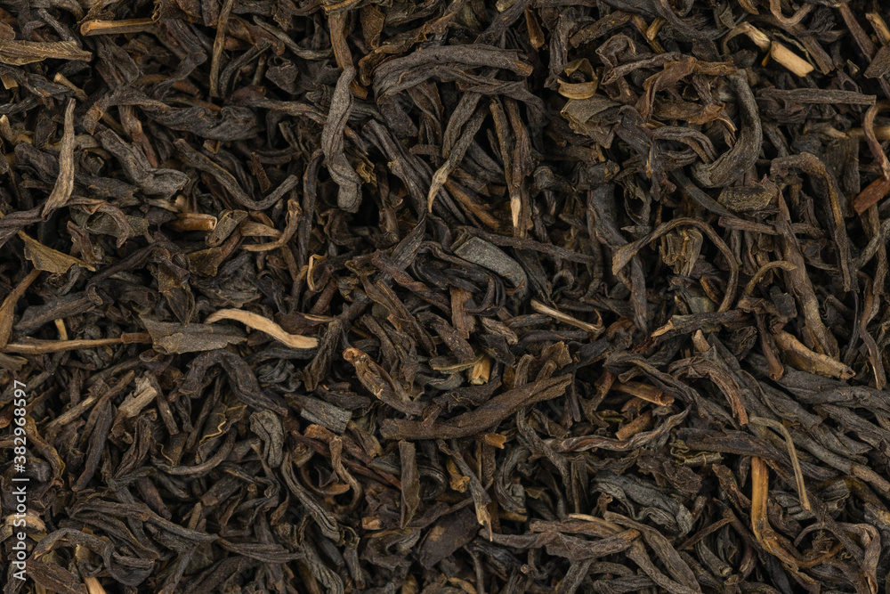 Dried tea leaves background texture. close-up Dried tea leaves background texture. close-up