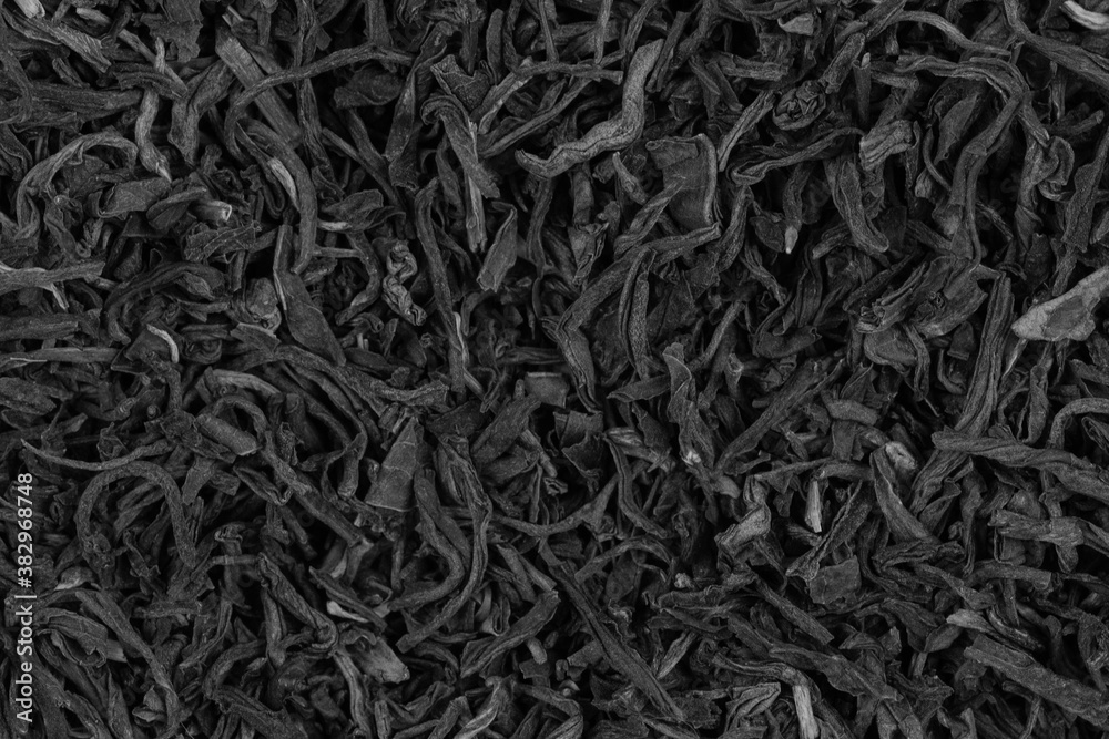 Dried tea leaves background texture. close-up Dried tea leaves background texture. close-up