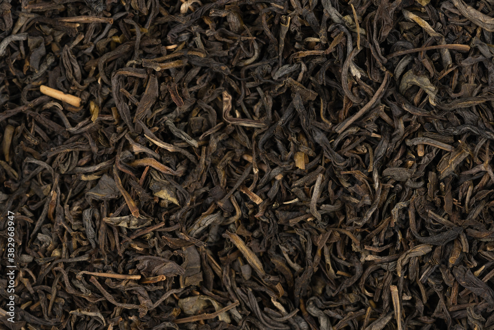Dried tea leaves background texture. close-up Dried tea leaves background texture. close-up