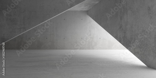 Abstract empty, modern concrete room with indirect lighting and diagonal walls and rough floor - industrial interior background template
