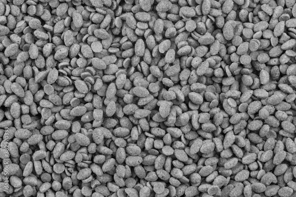Food for animals background. Dry cat and dog food texture. Pet meal background close up Food for animals background. Dry cat and dog food texture. Pet meal background close up