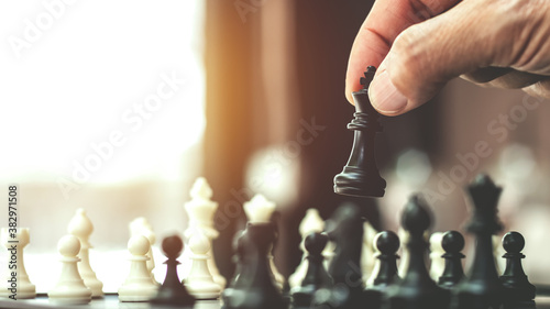 Business strategy, Chess board game management to victory.