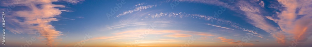 Naklejka premium Colorful sky with cirrus clouds during dawn. High resolution panorama. View from drone