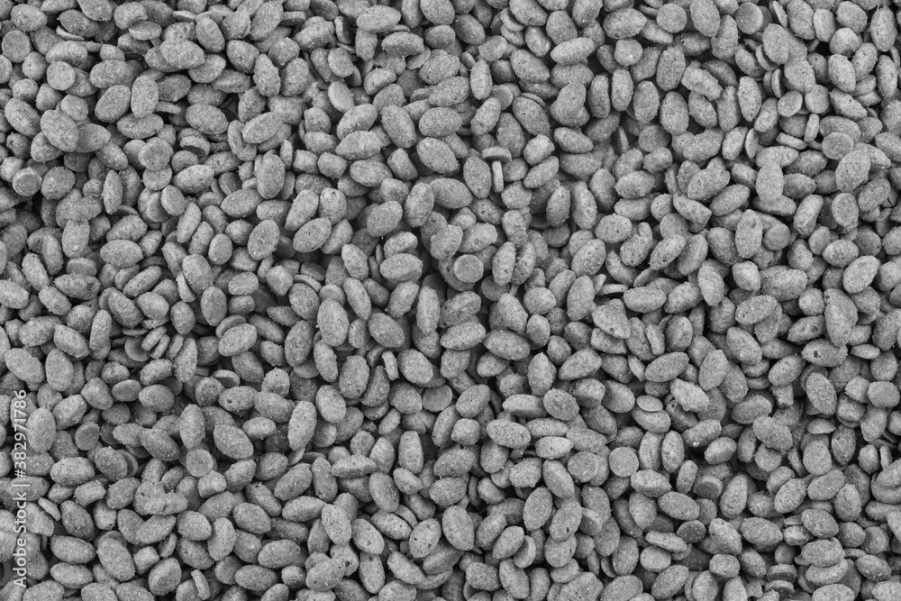 Food for animals background. Dry cat and dog food texture. Pet meal background close up Food for animals background. Dry cat and dog food texture. Pet meal background close up