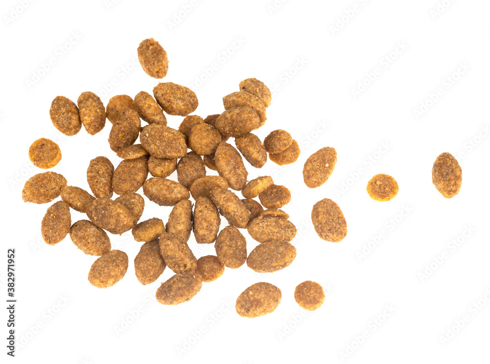 Food for animals isolated white background. Dry cat and dog food texture. Pet meal background close up Food for animals isolated white background. Dry cat and dog food texture. Pet meal background close up