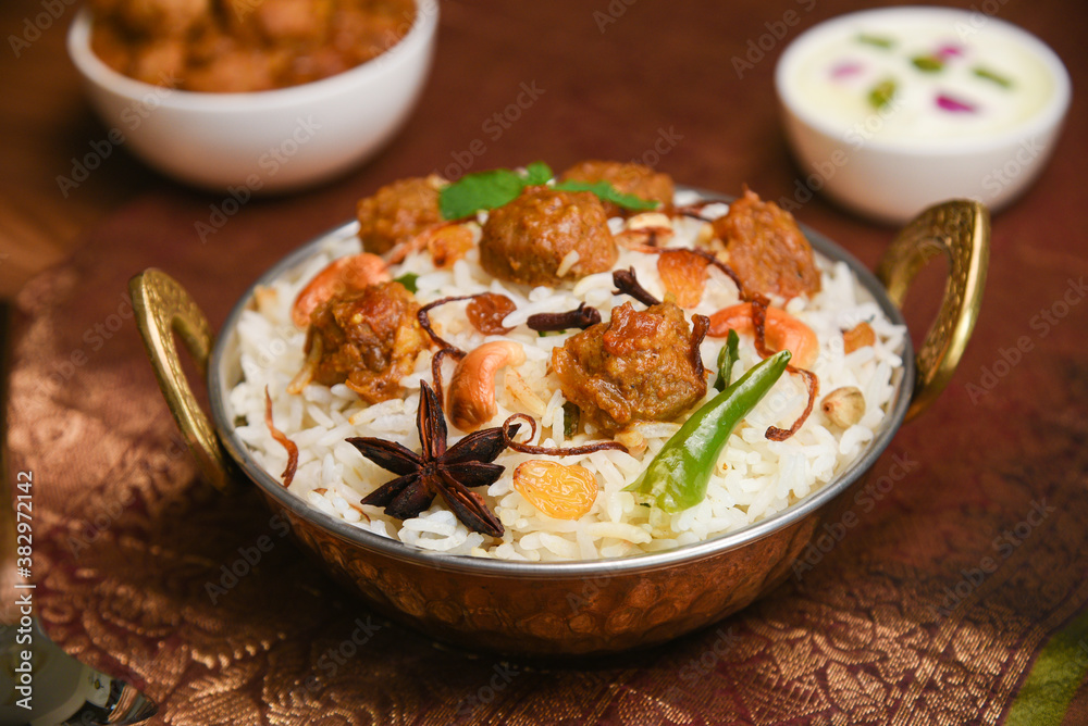 Veg biryani or soya biryani. Spicy Indian Malabar biryani or Hydrabadi biryani, Dum Biriyani, pulao, pulav, pilaf, basmati rice, spicy mixed rice dish with meat curry for Ramadan Kareem, Eid