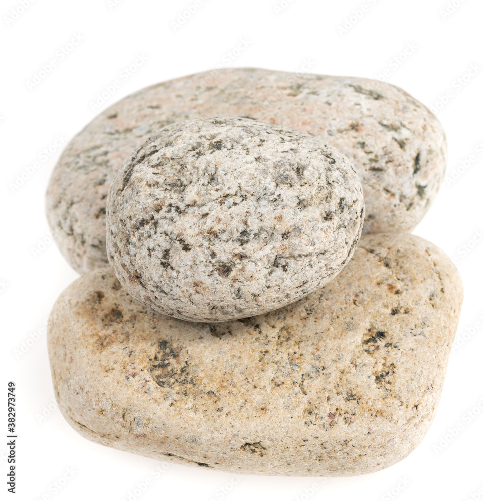 Natural large stone, cobblestone isolated on white background. stones for baths and saunas Natural large stone, cobblestone isolated on white background. stones for baths and saunas