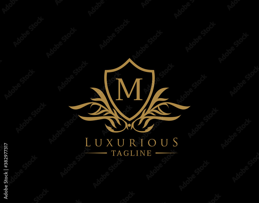 Classic Shield Logo With M Letter. Elegant Shield badge With Floral Shape perfect for fashion, Boutique, Jewelry, Hotel, Restaurant. Classic Shield Logo With M Letter. Elegant Shield badge With Floral Shape perfect for fashion, Boutique, Jewelry, Hotel, Restaurant.
